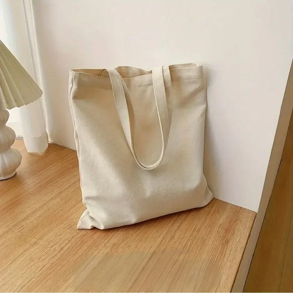 “Things I Need: Coffee, More Books, Reading Time” Canvas Tote Bag - Picture 6 of 7